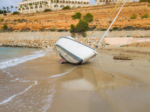 istock The yacht is shipwrecked and thrown ashore 1030307508