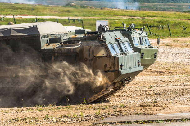 istock The front of the tank, riding through the dust. 1030314870