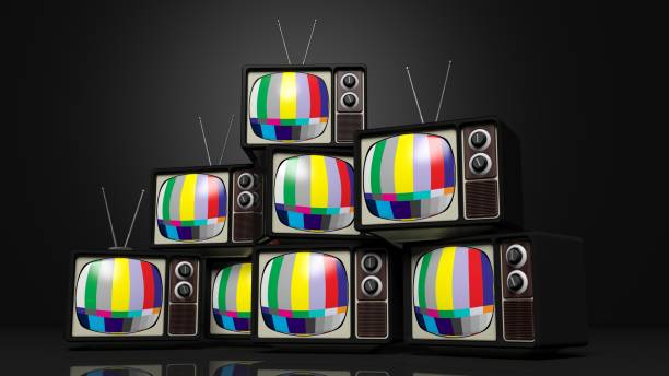 istock Antique TV sets with color bars on screen, on black background. 3D rendering 1030314872