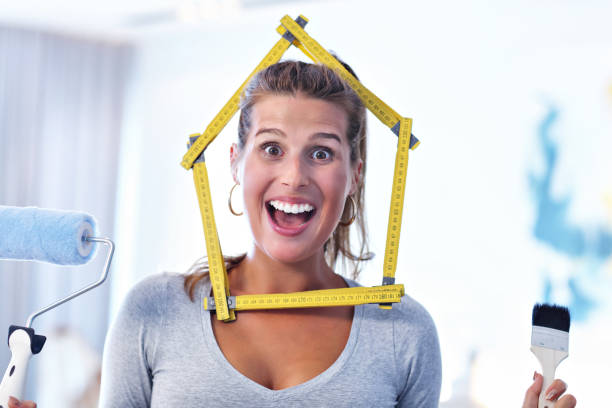 istock Mature woman doing home improvements 1030315686