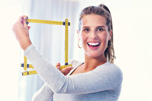 istock Mature woman doing home improvements 1030315832
