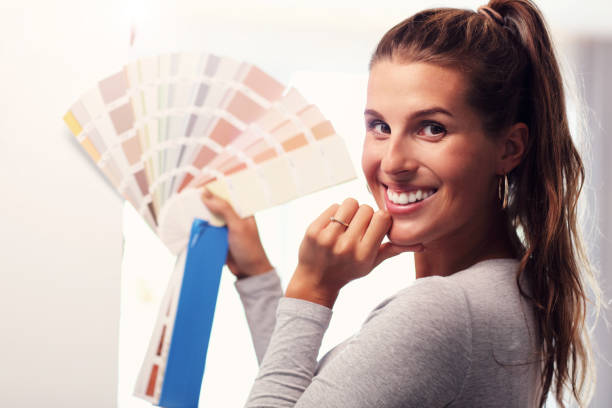 istock Mature woman doing home improvements 1030316204
