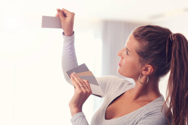 istock Mature woman doing home improvements 1030316246