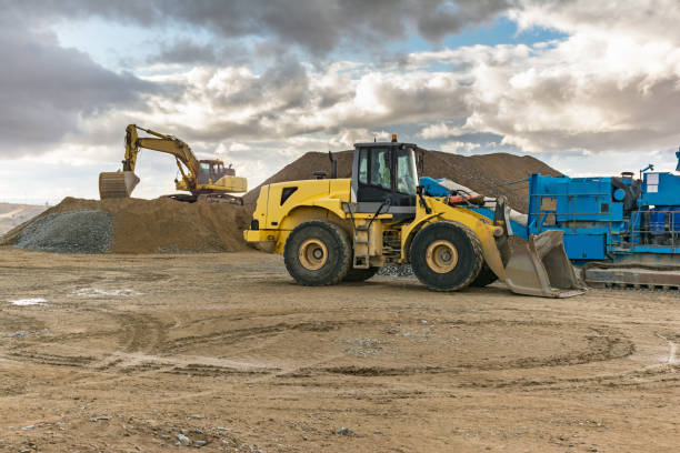 istock Large excavator working on the construction of a road 1030319040