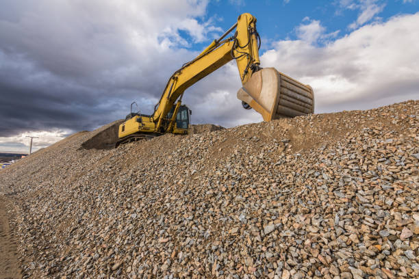 istock Large excavator working on the construction of a road 1030319044