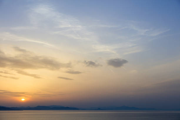 Sundown in mountains over sea