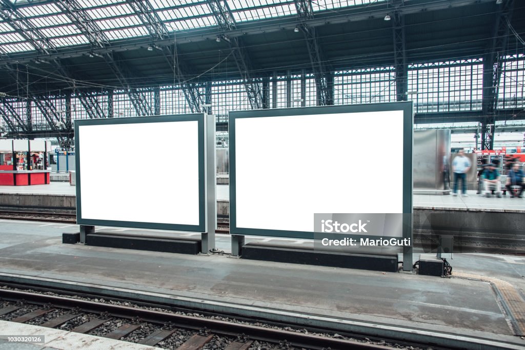 Two blank billboards at railroad station Billboard Stock Photo