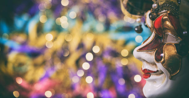 istock Carnival mask on colorful blur background 1030323036
