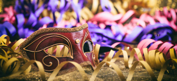 istock Carnival mask on colorful blur background 1030323052