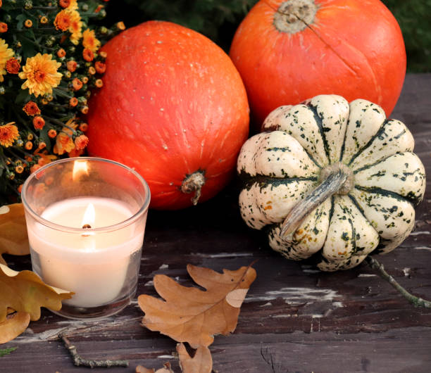 istock Decorative halloween pumpkins and candles. Autumn concept. 1030334758