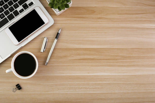 istock Top View Wood Office Desk Table 1030337480