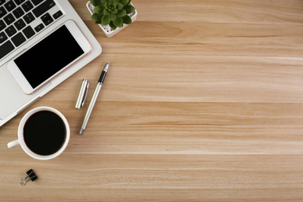 istock Top View Wood Office Desk Table 1030337496