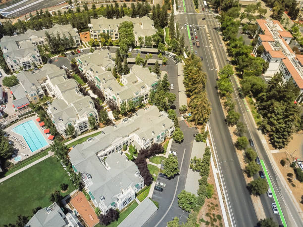 istock Top view apartment complex with swimming pool near freeway in Silicon Valley 1030344888