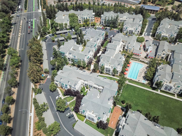 istock Top view apartment complex with swimming pool near freeway in Silicon Valley 1030349424