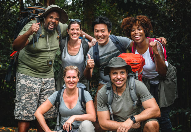 istock Group of happy diverse campers 1030361608