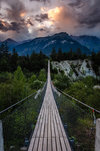 Evening shot of a wooden hanging bridge near the towns Susten and Leuk in Canton Wallis