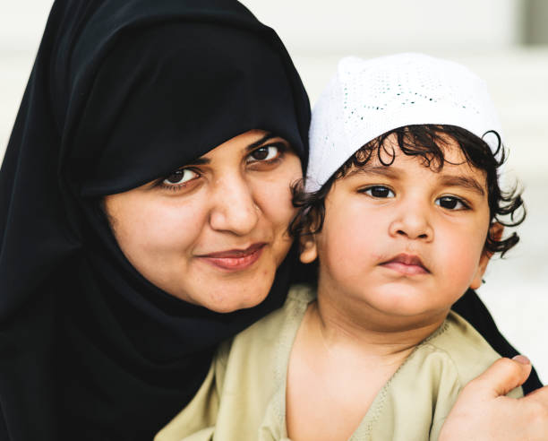 istock Muslim mother and her son 1030370170