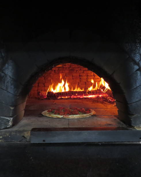 istock baked pizza in the wood oven 1030375122