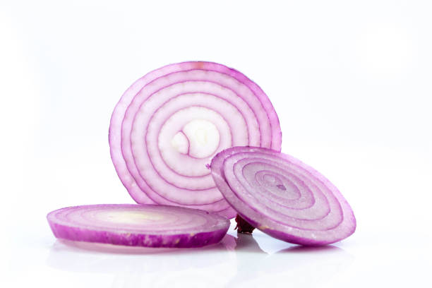 istock Fresh red onions slice isolated on white background 1030375268