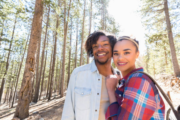 istock Young couple on mountain hike 1030376170
