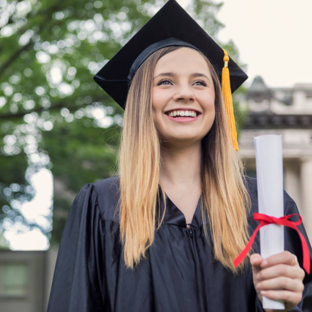 istock Excited female college graduate 1030376560