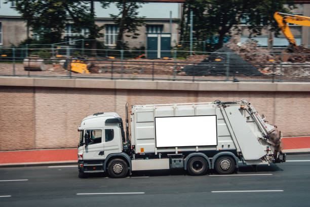 istock Garbage truck with billboard 1030379804