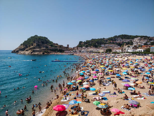 istock Beach with bathing people, Costa Brava, Tossa de Mar, Spain 1030380222