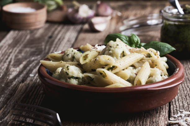 istock Pasta pesto with cauliflower and cheese 1030380540