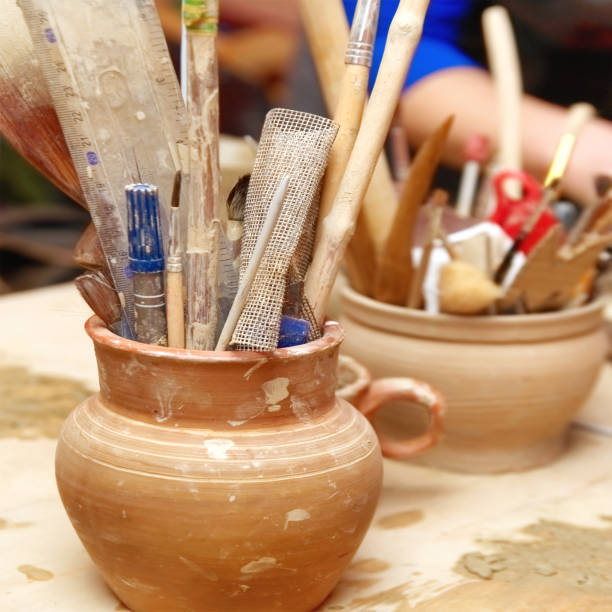 istock Handmade old clay pots with pencils 1030383128
