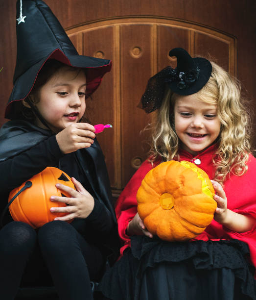 istock Little kids at a Halloween party 1030383420