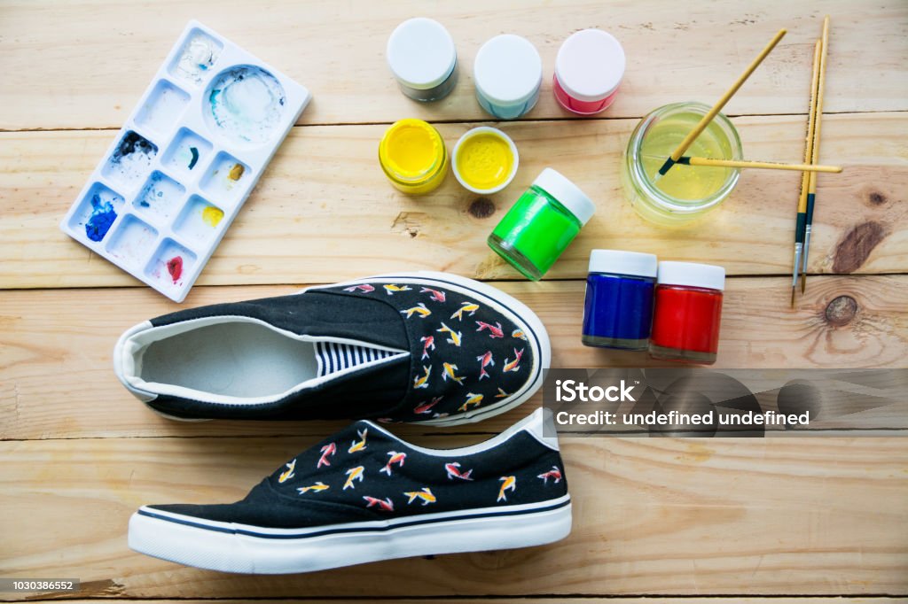 Hand Made Painted Canvas Shoes With Acrylic Paint And Paintbrush Stock  Photo - Download Image Now - iStock