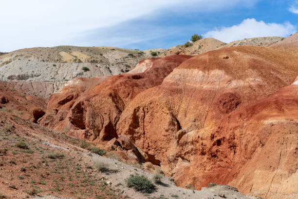 istock Landscape with red hills and mountains 1030396008