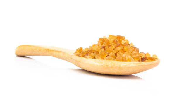 istock Brown sugar gravel in spoon isolate on white background 1030405598