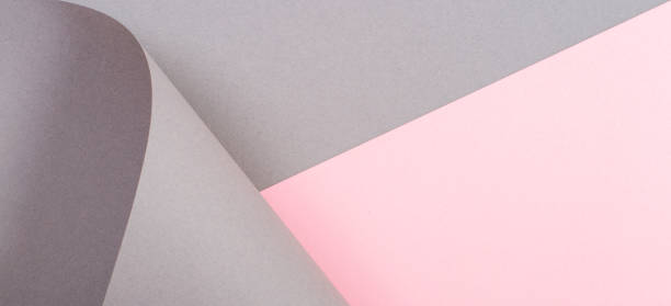 istock Abstract geometric shape gray and pink color paper background 1030408120