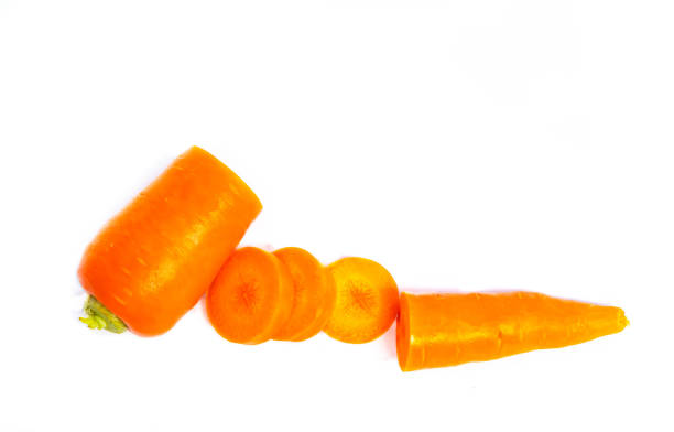 istock Fresh carrot group slice isolated on white background 1030408240