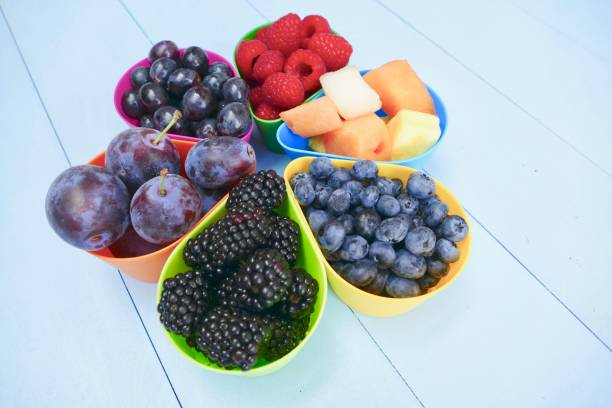 istock Collection of fresh fruit and berries 1030419428