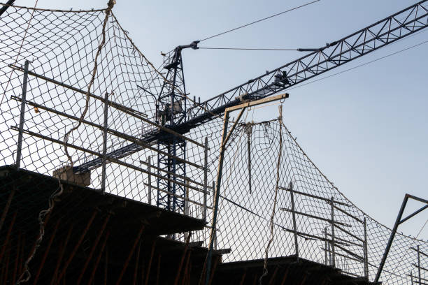 istock Crane building new house 1030426096
