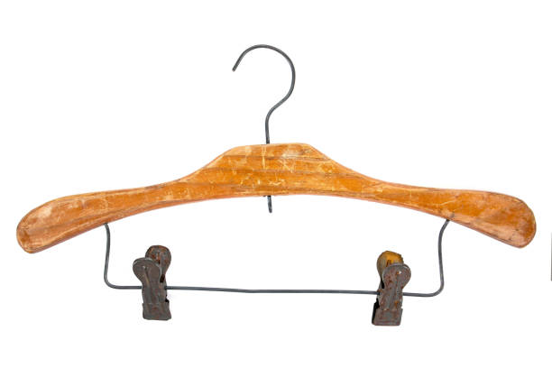 istock Old wood cloth hanger with clips isolated on white background 1030432924