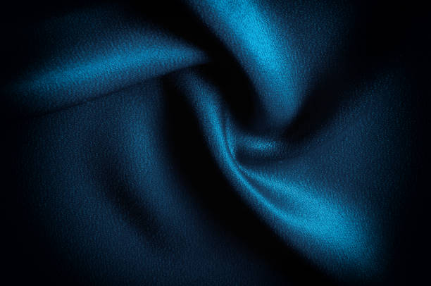 istock Texture, background. template. Silk fabric blue, Blue silk drapery and upholstery fabric from the courtyard - Dark curtains - Solid fabrics for backs and pillows 1030433760