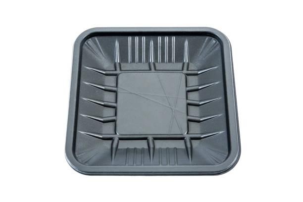 istock Plastic food tray isolated on white background.Black rough surface plastic food tray 1030434710