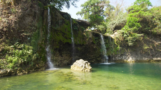 istock Beautiful tropical waterfall. Philippines, Luzon 1030437078