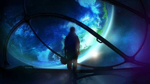 The astronaut looks at the globe
