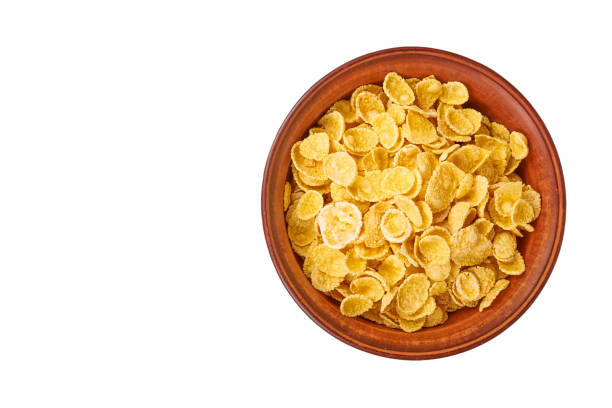 istock bowl of corn flakes isolated on white background, copy space template 1030438572