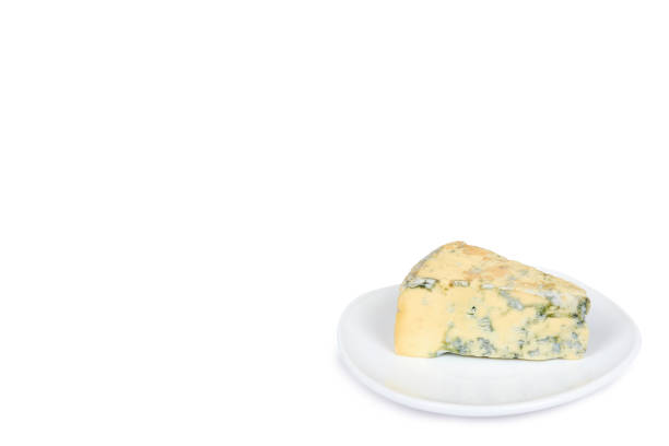 istock Piece of milky blue cheese, isolated on white background, copy space template 1030439072