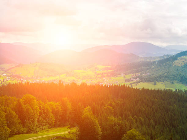 istock Summer mountain landscapes. Green meadows. High hills.. Sunset 1030446458
