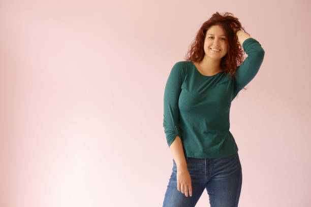 istock Beautiful girl on the pink background 1030454520