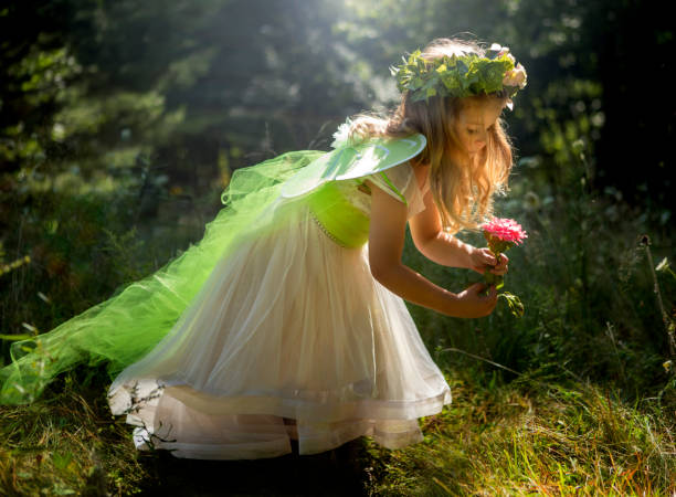 little girl dressed as a fairy. - coroa de flores imagens e fotografias de stock