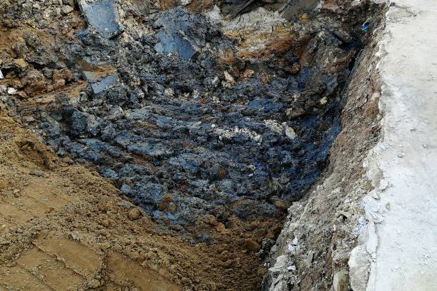 istock wet and dirty soil after dig by backhoe 1030467100