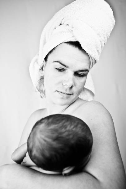 istock Maternal Bond - Mother And Child (New-Born Baby). Monochrome /Black & White 1030471814