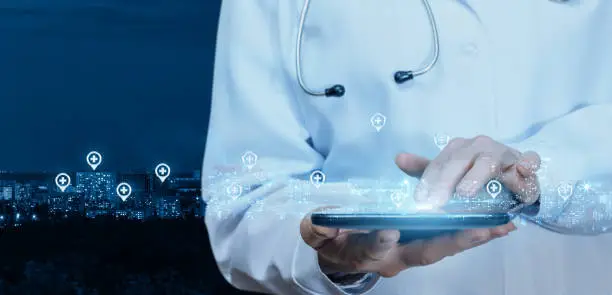 Photo of Doctor working at the medical network on the tablet .